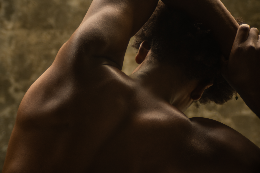 Back view of a man receiving a relaxing massage at Botica Spa in the Riviera Maya.